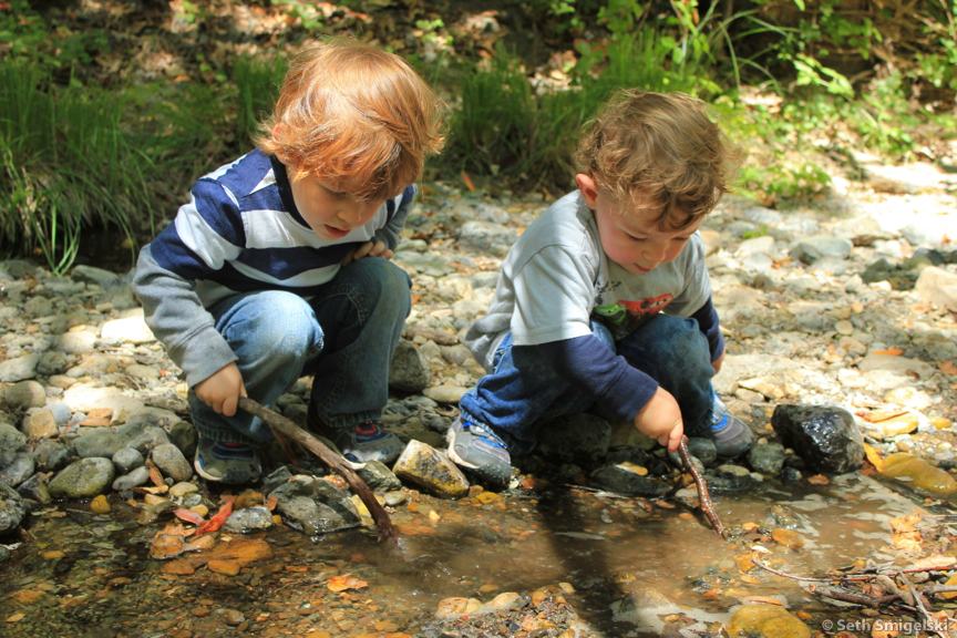 Boys with sticks in Reservoir Canyon Creek